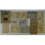 A collection of vintage cigarette card albums from the 1930s comprising W.