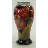 William Moorcroft Burslem vase decorated with Pomegranates on light green/yellow ground, height 22.