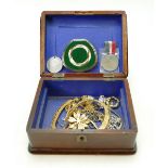 Edwardian oak box containing costume jewellery, chains, necklaces,