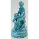 19th Century large turquoise glazed female figure seated on a rock 47cm tall