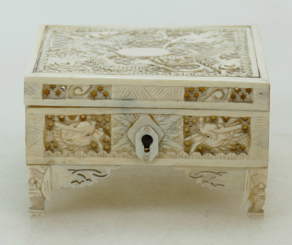 Early 20th century Chinese carved Ivory small trinket box carved with dragons all around, 8.5 x 7.