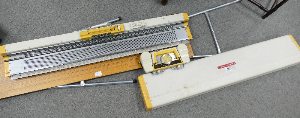 An Empisal Knitmaster model 321 knitting machine and stand (2).