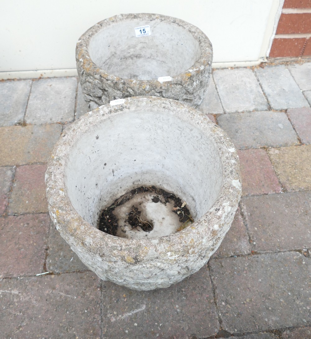 Two large round concrete planters (2)