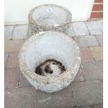 Two large round concrete planters (2)