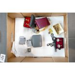 A mixed collection of items to include cased cufflink sets, Polo branded cigarette lighter,