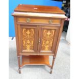 Mahogany inlaid music cabinet.