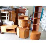 A mid-century teak G-Plan corner unit with a 2 drawers base and a slim shelving unit,