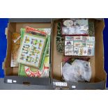 Two trays containing Meccano instruction booklets nos 3, 4a & 7/8, games, cigarette cards & albums,