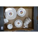 Bone china floral decorated part teaset embellished with still life scenes