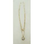 14ct gold pendant and necklace, the pendant set with solitaire diamond (approx .