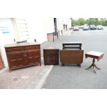 An assortment of 20th century oak furniture items to include a 2 over 2 sideboard, corner unit,