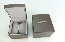 Ladies Gucci stainless steel designer wristwatch,