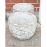 Two large round concrete planters (2)