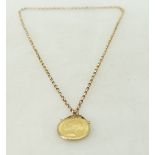 Gold Victoria shield back full sovereign dated 1863 with 9ct gold mount and 9ct gold necklace, 12.