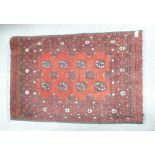 Afghan hand knotted rug (117cm x 77cm)