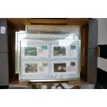 A collection of Royal Mail first day cover stamps all mounted and in gold frames,