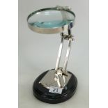 Large desktop magnifying glass on stand