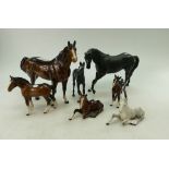 Collection of Beswick horses to include 915 Dapple grey and brown lying foals, x 2 brown foals,