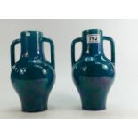 A pair of pottery two handled vases in a turquoise speckled glaze,unmarked,