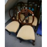 A set of 4 reproduction mid-Victorian style carved round back dining chairs on cabriole legs (4)