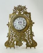 Ornate brass picture frame mantle clock with French balance movement,