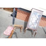 A mahogany astral glazed display cabinet with a camel saddle/stool. (2).