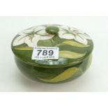 Moorcroft 1980s round box & cover decorated in the white lily design on green ground,