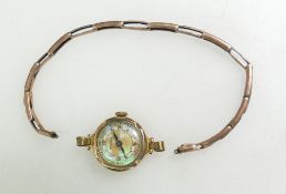 9ct vintage Ladies Medana wristwatch with lustred dial and gold on silver expandable bracelet