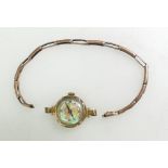 9ct vintage Ladies Medana wristwatch with lustred dial and gold on silver expandable bracelet