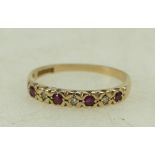 9ct gold ladies ring set with rubies and diamonds,size N, 1.