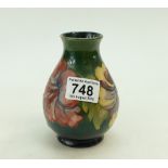 Moorcroft vase decorated in the hibiscus design,