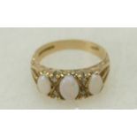 9ct ladies ring set with three opal stones, size M, 3.