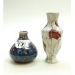 Cobridge Stoneware small squat vase decorated with mottled coloured glazes and a Black Ryden poppy