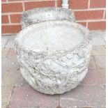 Two large round concrete planters (2)