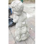 Novelty concrete garden figure of Cherub and smaller shy boy (2)
