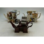 A collection of Cardew type teapots to include The Cardew Collectable Teapot Stall,