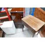 A mid century Singer sewing machine table with a reproduction mahogany record cabinet and a Lloyd