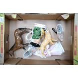 A collection of pottery to include Beswick lioness 2097, Beswick brown Horse,