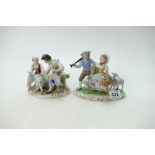 A collection of Voight Sitzendorf ceramic figures of shepherds and sheep together with a similar
