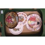 A collection of Royal Doulton plates including ser