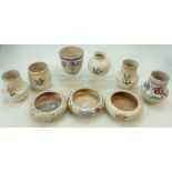 A collection of Poole Pottery floral dec