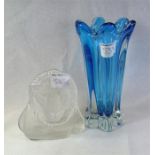 A vintage Whitefriars style fluted blue glass vase and a Royal Krona of Sweden Lion figure, designed