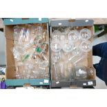 A mixed collection of glassware including vases, wine glasses, trays etc (2 trays).