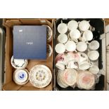 A large collection of commemorative cups, saucers, plates, etc.