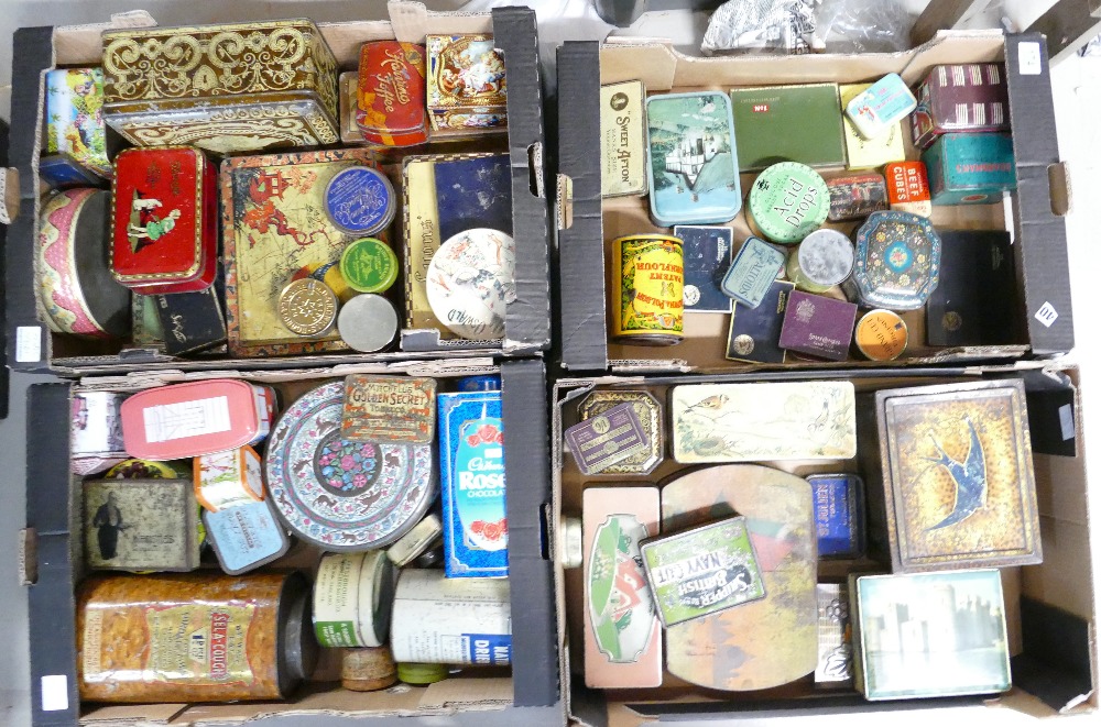 A large quantity of vintage tins advertising a range of products from dried milk to chocolate