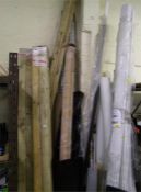 Large collection of lengthy items to include wooden patio beams and flagging, plastic tubes,