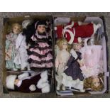 A collection of porcelain dressed dolls produced by Leonardo (2 trays)