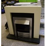 A used electric fire and surround, untested.