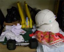 A mixed collection of clothing and work wear to include hard hats, Resprex wellies, Steel capped