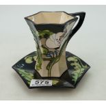 A Moorcroft Au-Lait coffee cup & saucer.